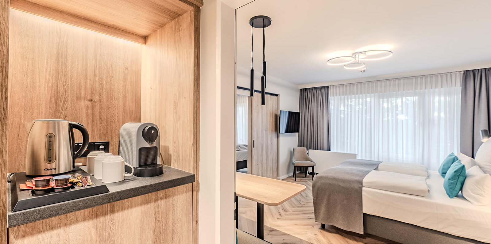 AH Deluxe Family Room with sliding doors and kitchen